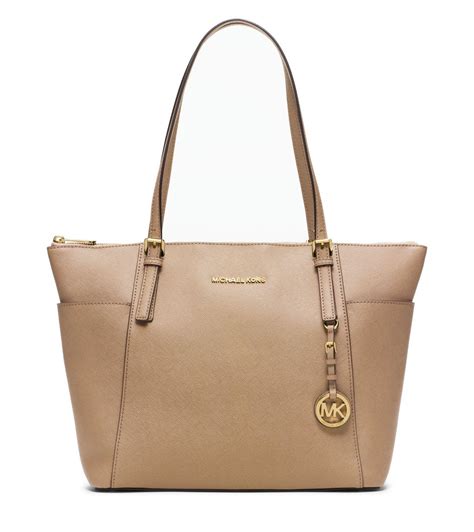 michael kors jet set large leather pocket tote|Michael Kors bag with airplanes.